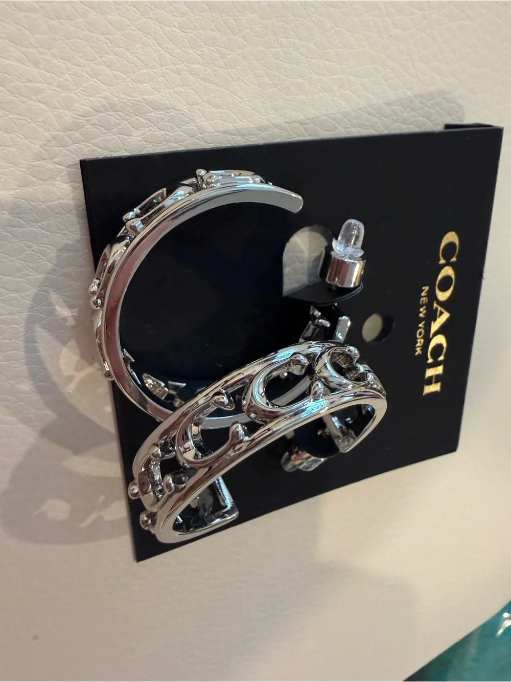 Coach Silver-Tone Cutout Hoop Earrings with Black Interior - Picture 2 of 4